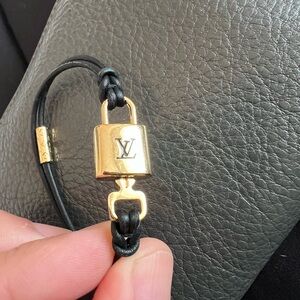 LV Padlock Bracelet (pre-loved) - visible scratches. - Very good conditions.